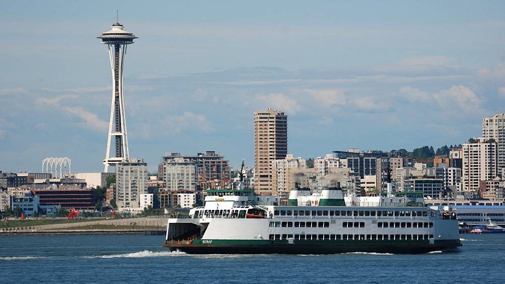 The Seattle waterfront with a Washington state ferry and the space needle