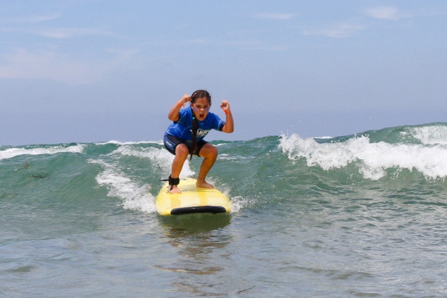 SurfDiva - thrilled surfer