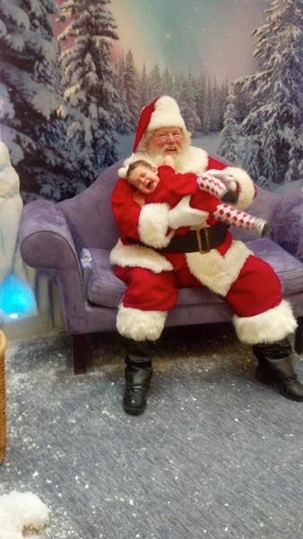 Here's 14 month old Tess with Santa. 