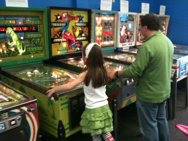 Seattle Pinball Museum Dad and daughter
