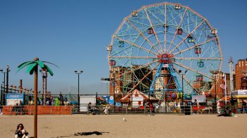 Coney Island beach with Wonder Wheel and amusement park