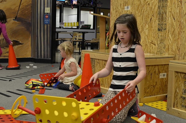 Girls Play construction zone Imagine Children's Museum