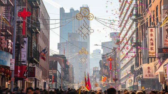 Chinatown in New York City during Lunar New Year parade in streets