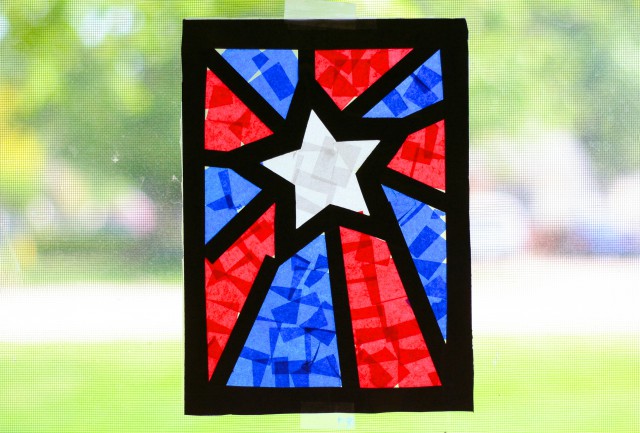A patriotic window suncatcher in a star shape for a fourth of July craft
