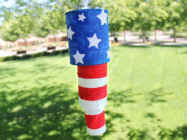 Metal cans painted like the American flag for a fourth of July craft