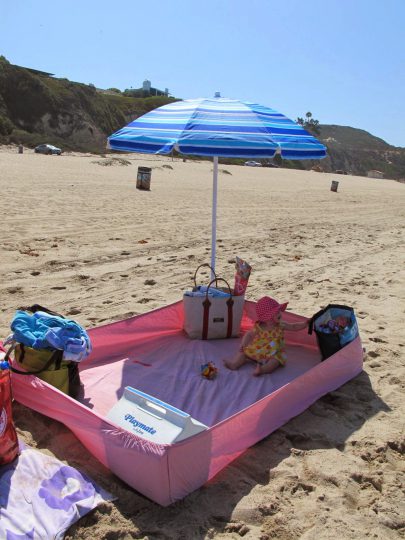 fitted sheet hack at the beach - baby beach hacks
