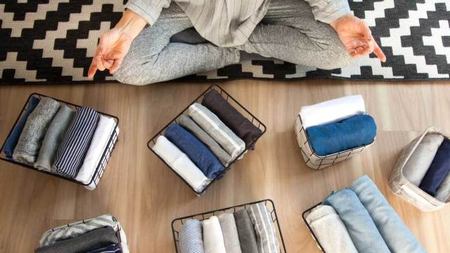 woman folding clothes