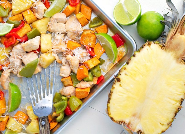 A Hawaiian chicken recipe made in a sheet pan with pineapples, peppers and sweet potatoes