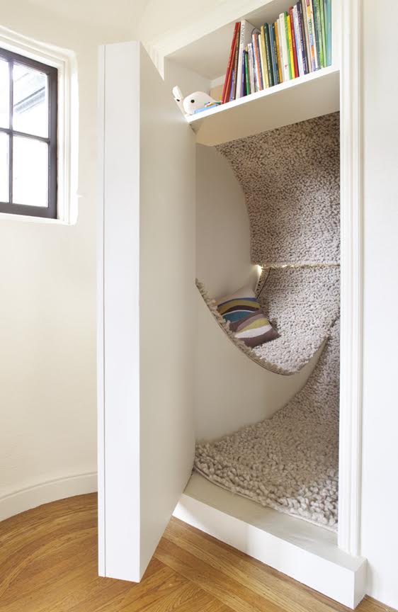 this hidden reading nook is the perfect small play space