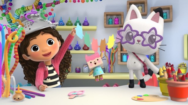 The animated show Gabby's Dollhouse is a favorite toddler tv show, including arts, crafts, and kitty