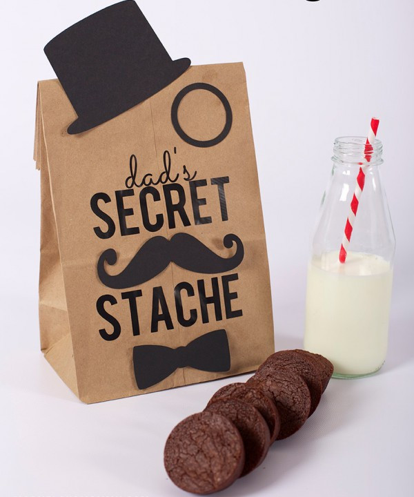 snacks and brownies inside a personalized brown bag as a father's day card