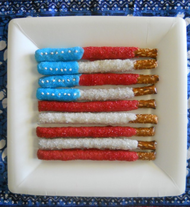 pretzels covered in white chocolate and sprinkles to look like the American flag for Memorial Day