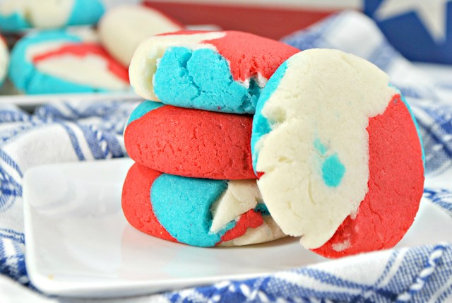red, white and blue round cookies on a plate for Memorial Day