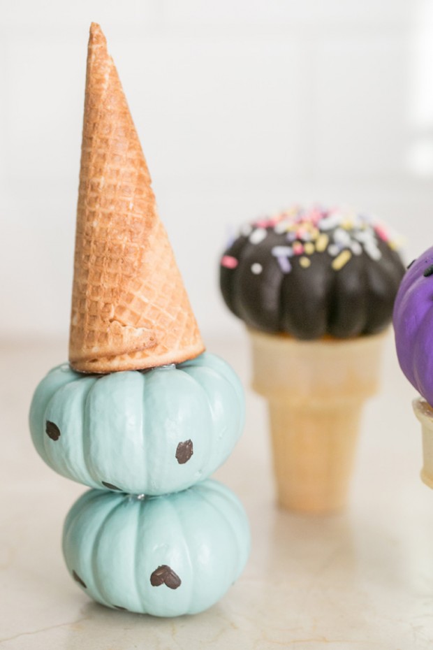 Mini pumpkins are decorated to look like ice cream cones