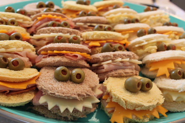 Mini monster sandwiches topped with olive eyes