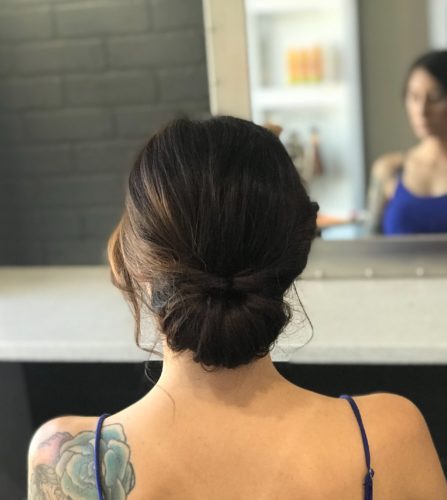 an elegant updo is a great holiday hairstyle