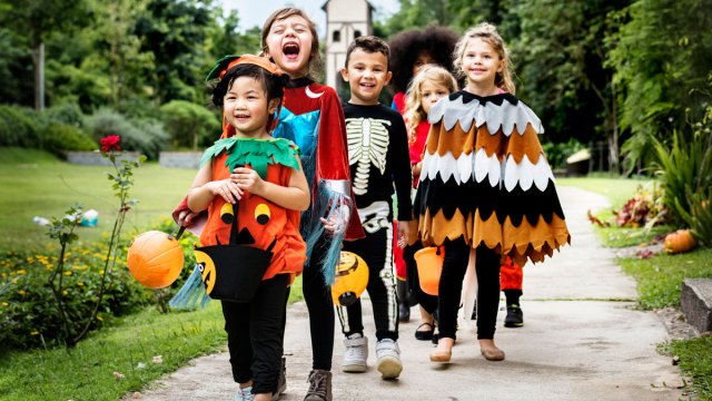 kids walking around in costumes on halloween