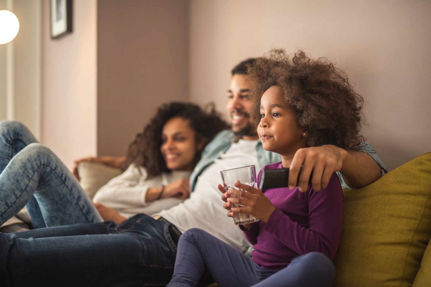 dad and kids watching family movies 