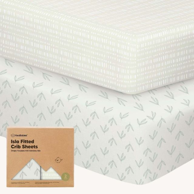 two sets of crib sheets on crib mattresses