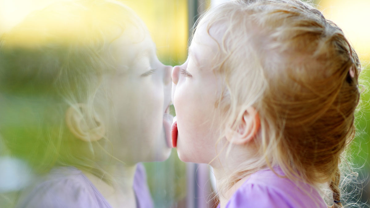 girl-licking-window