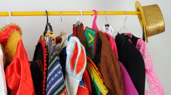 clothing rack of costumes and accessories