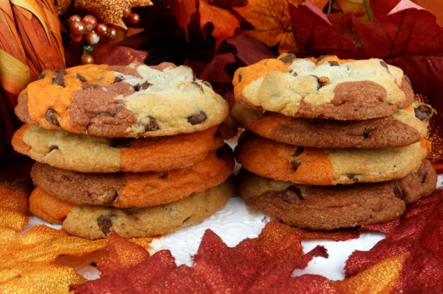 Two stacks of harvest marble chocolate chip cookies as part of a spread for a fall dinner