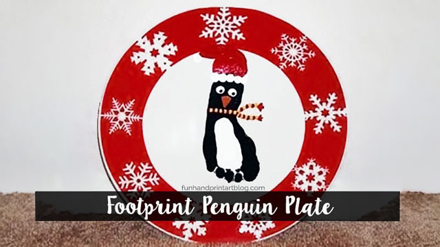 This penguin plate is a cute Christmas footprint art idea