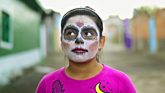 one Day of the Dead fact is that people gather with their families