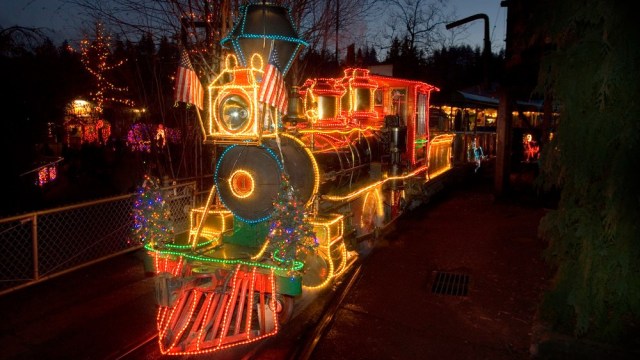 a lighted train at the Oregon Zoo is part of Zoo Lights and a chance for kids to take Santa pictures in Portland
