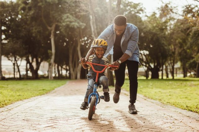 9 Foolproof (& Tear-Free) Ways to Get Your Kids Riding a Bike