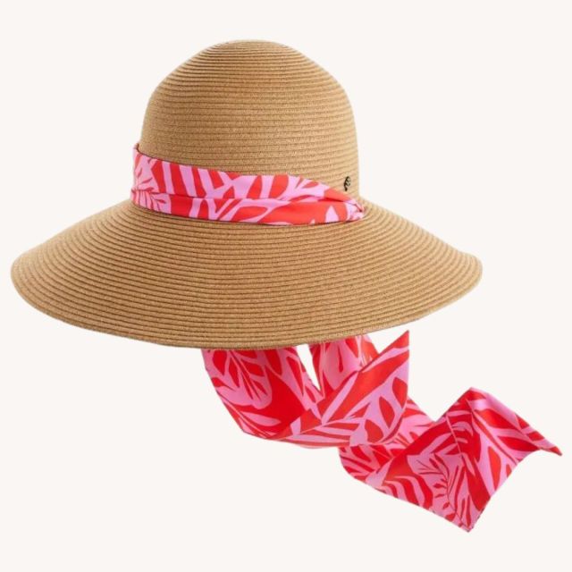 tan straw hat with pink scarf