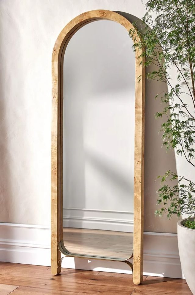 light brown standing arched mirror
