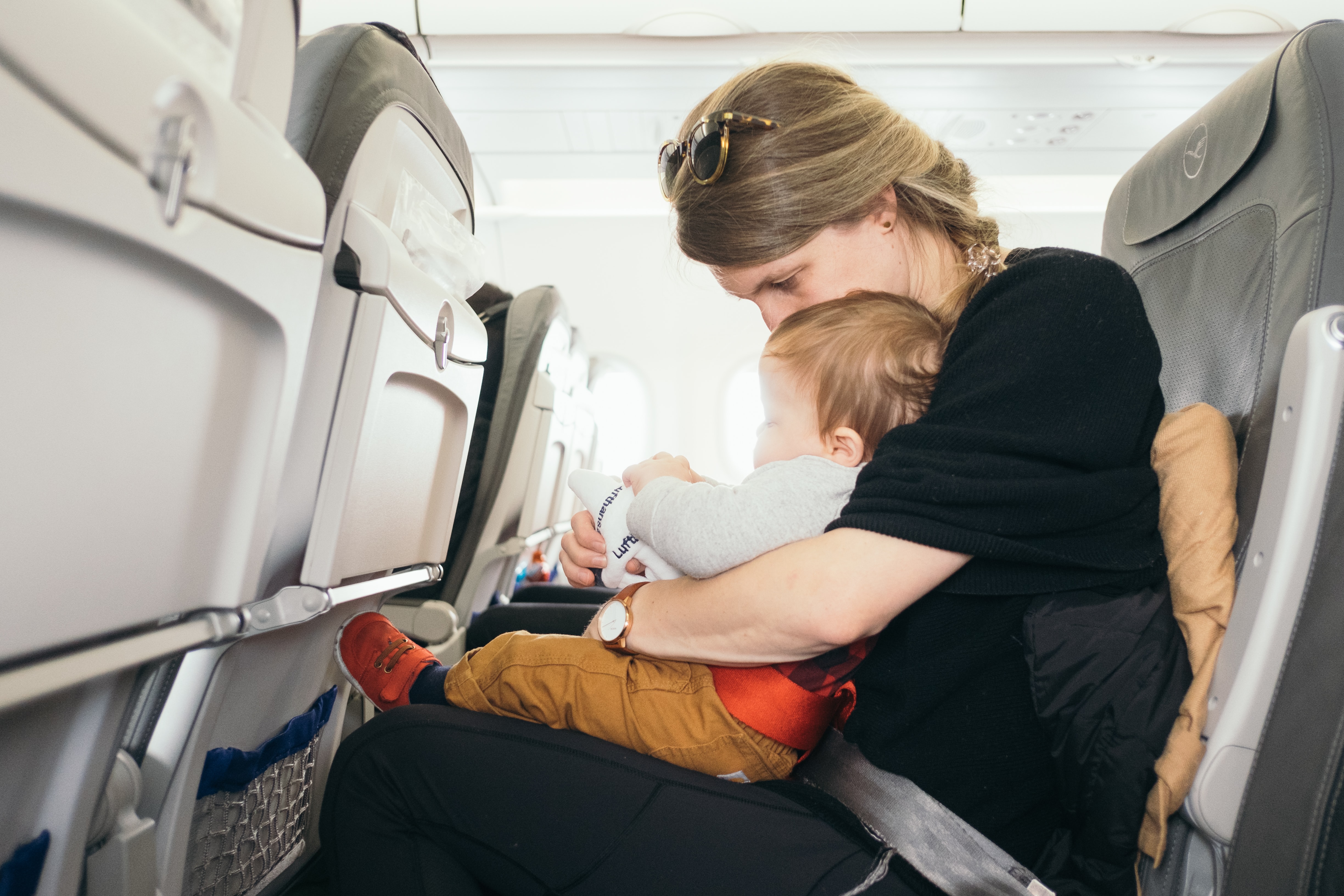 Woman and child on plane