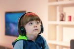 kid with headphones