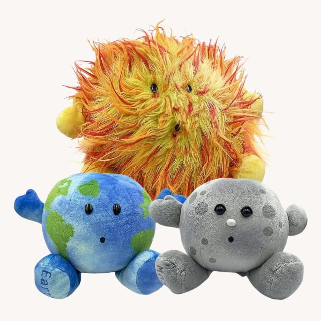 set of sun, earth, and moon stuffed toys