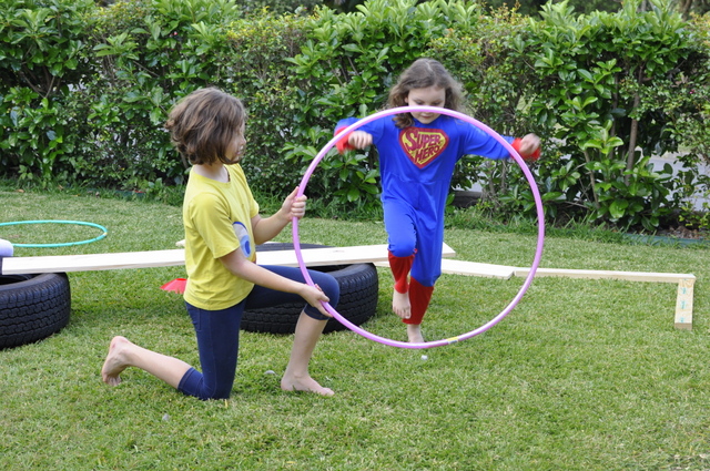 obstacle course for kids using hula hoops