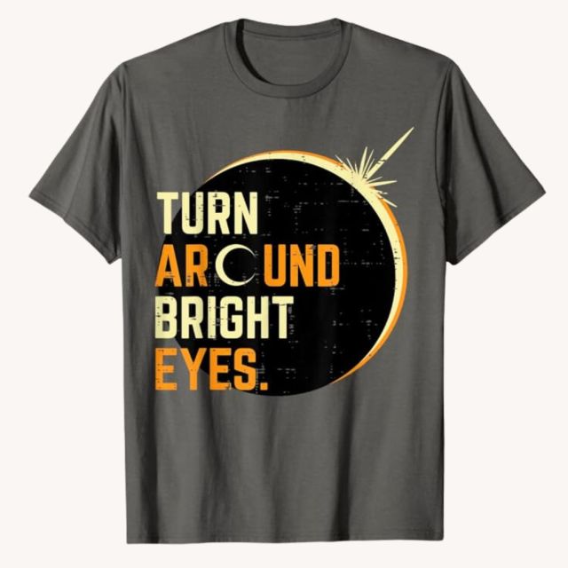 grey t-shirt with 'turn around bright eyes' text