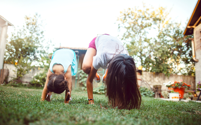 kids outdoor exercise at home siblings backyard active yoga exercise, virtual camp, gymnastics