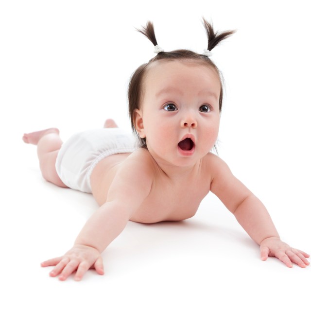 baby surprised expression wearing diaper - money-saving tips
