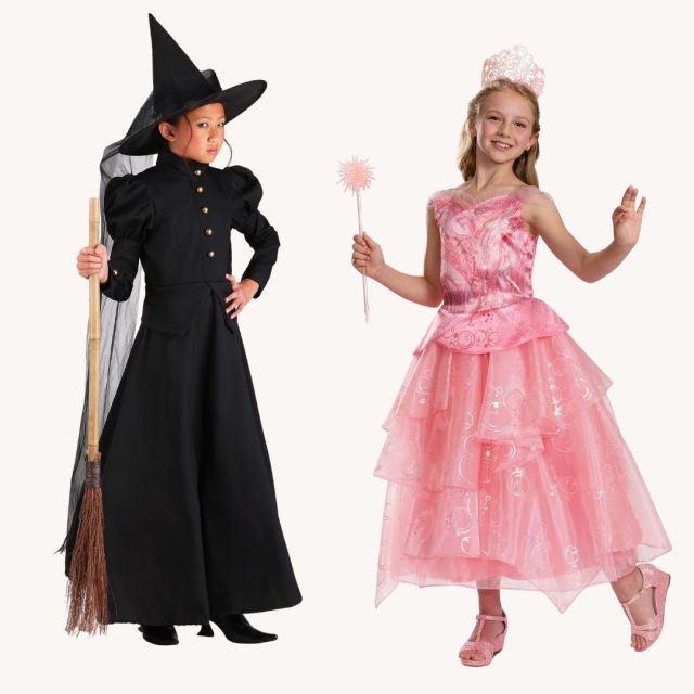 two girls wearing good witch and bad witch costumes from Wicked