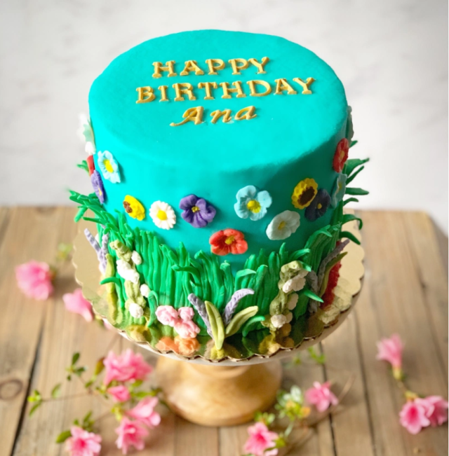 Teal cake with flowers