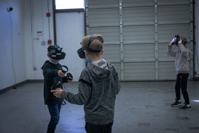 Boys with VR equipment