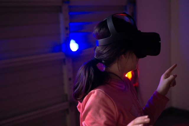 Girl with VR equipment
