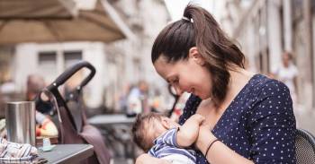 breastfeeding mom & baby at cafe - breastfeeding essentials