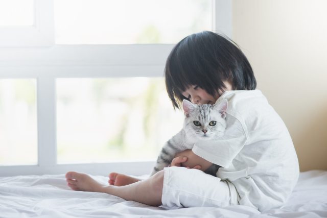Signs Your Kid Is Ready for a Pet (According to Experts)