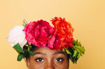 Girl wearing flower crowns in her hair
