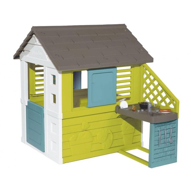 green and blue plastic kids playhouse