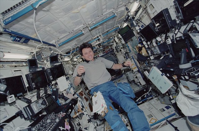 LatinX hero Franklin Chang-Diaz smiles from a control center in space