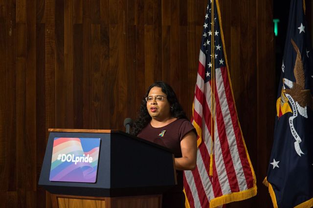 transgender rights activist Raffi Freedman-Gurspan speaks in front of an American flag and is known as one of our LatinX heroes