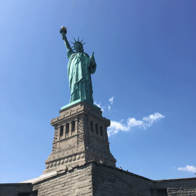 A view looking up at the Statue of Liberty